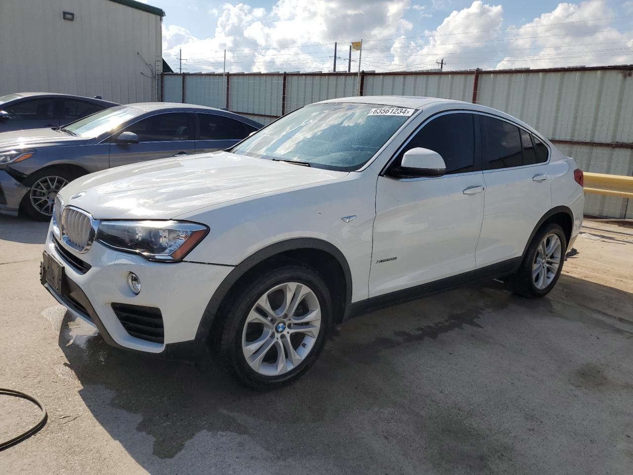 2015 BMW X4 xDrive28I VIN: 5UXXW3C50F0M88167 Lot: 63561234