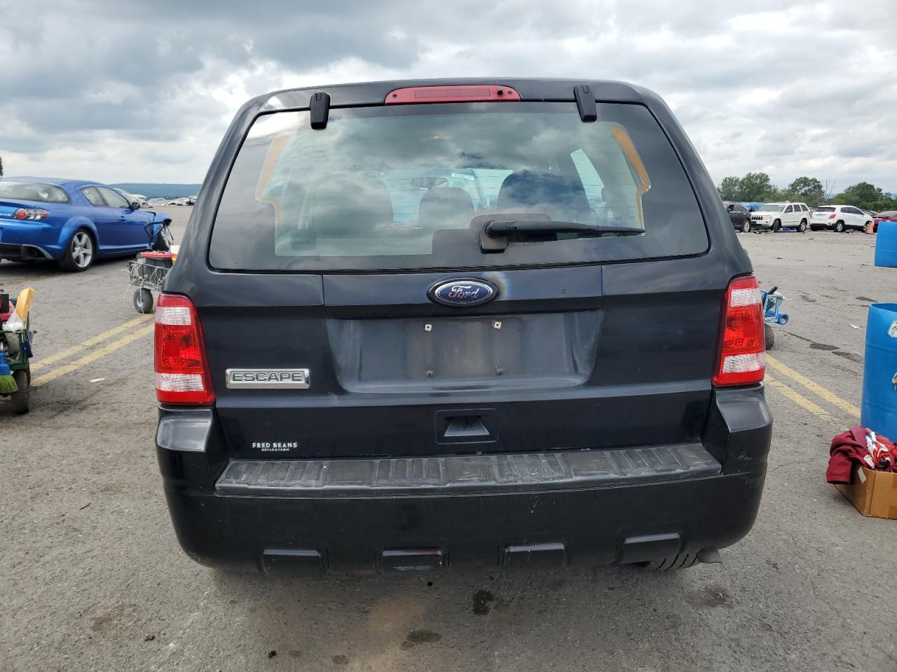 2010 Ford Escape Xls VIN: 1FMCU0C71AKC52805 Lot: 65452934