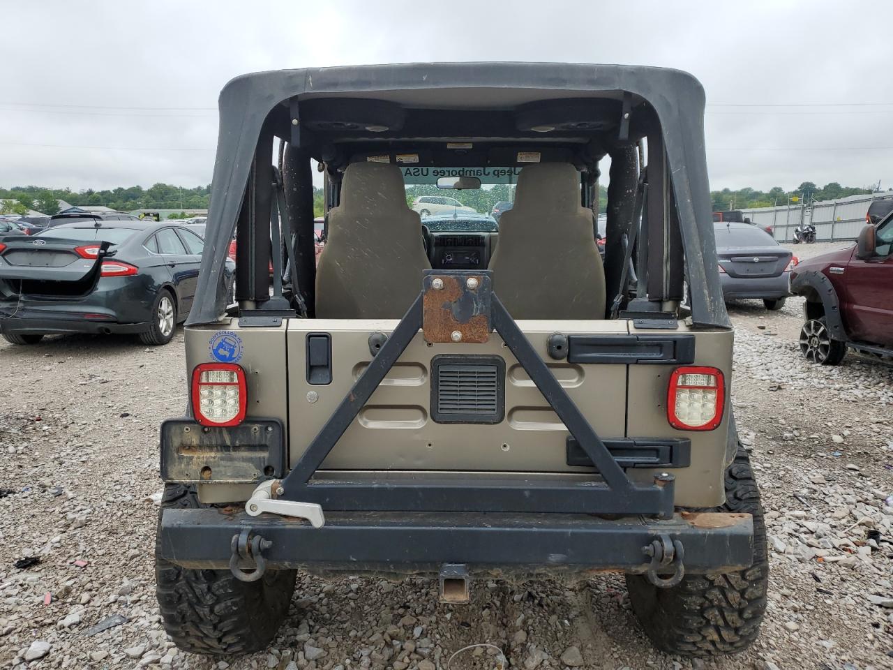 2004 Jeep Wrangler / Tj Rubicon VIN: 1J4FA69S94P774219 Lot: 62806594