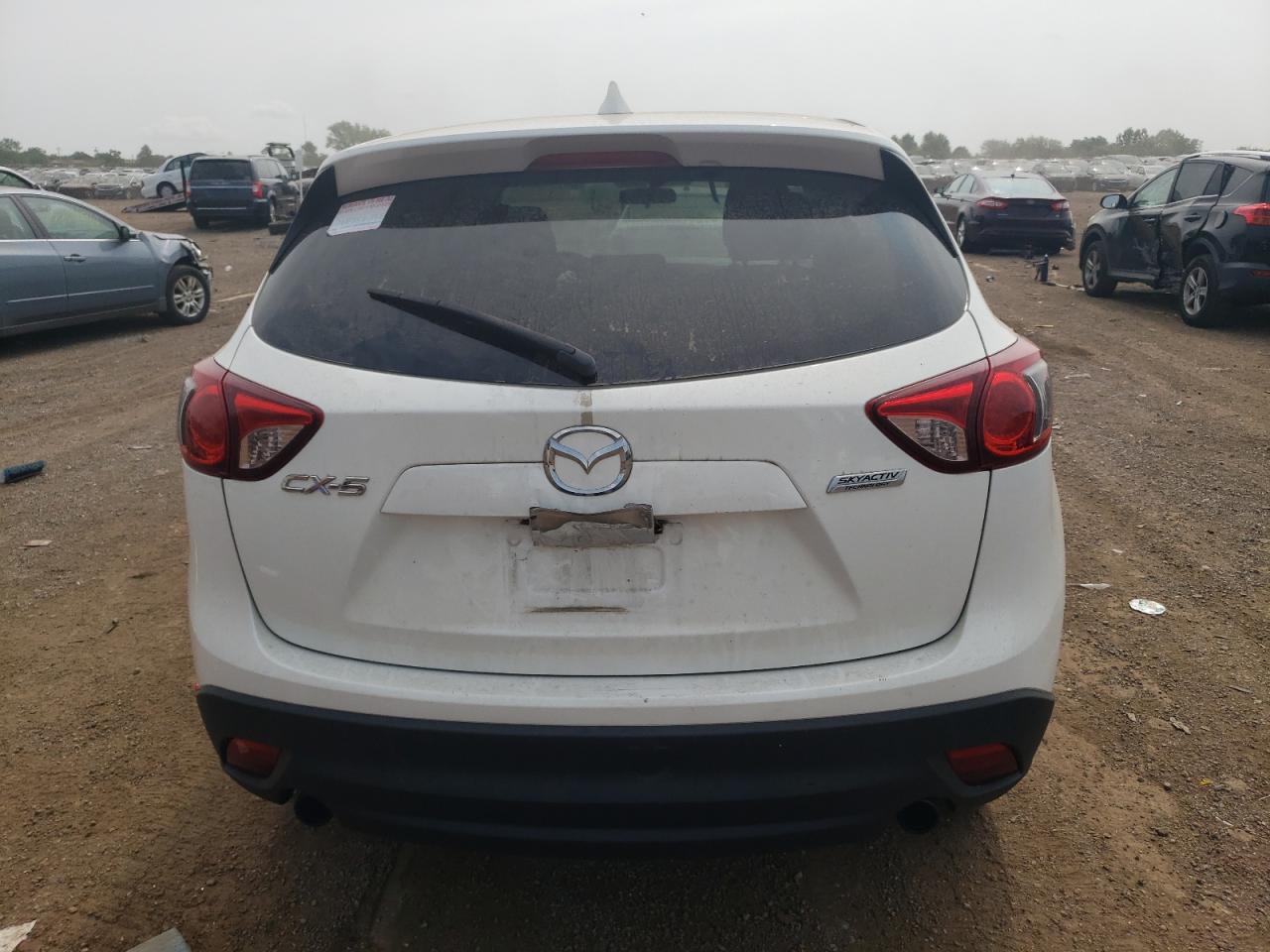 2014 Mazda Cx-5 Touring VIN: JM3KE2CY6E0429164 Lot: 63714934