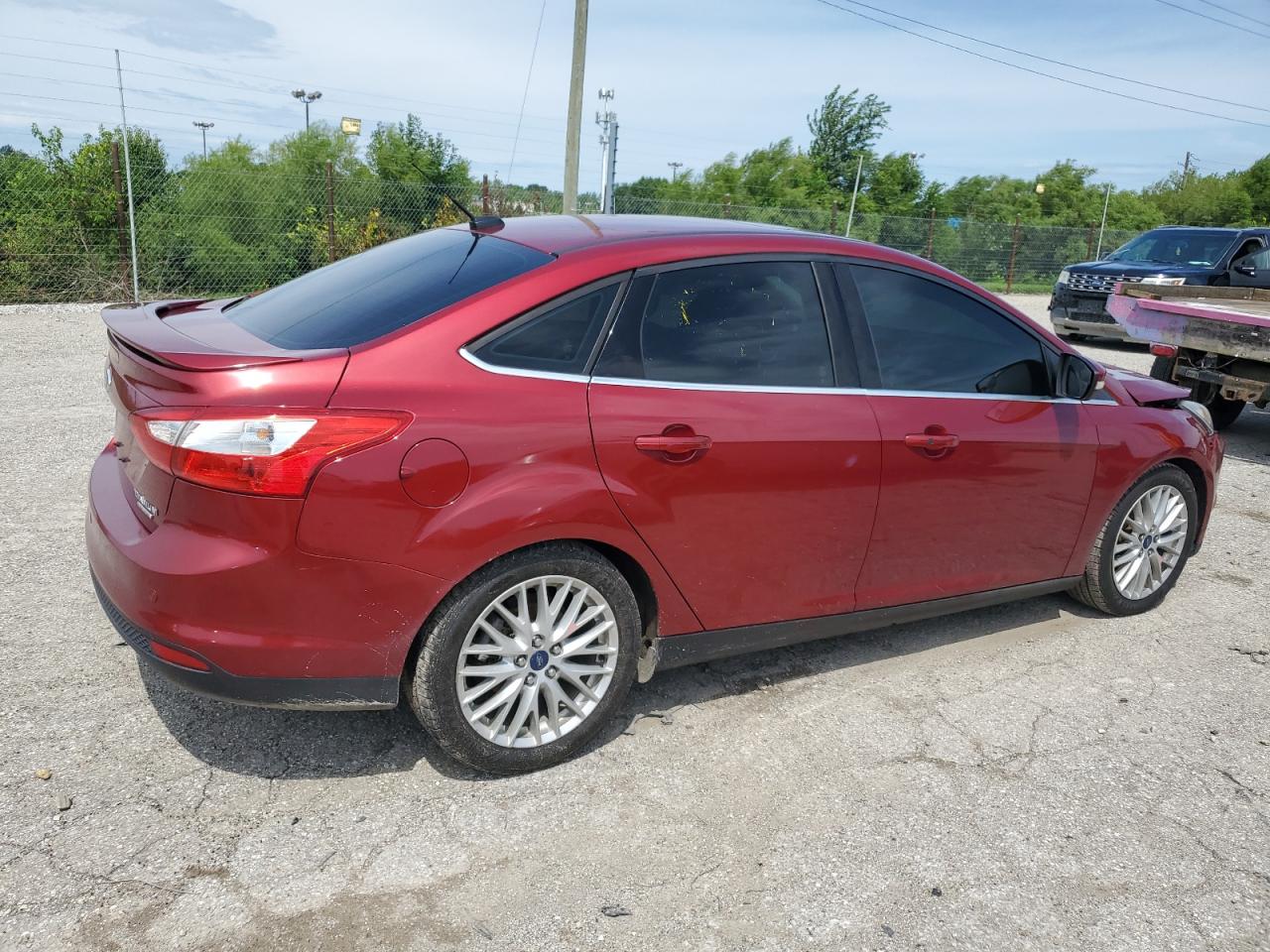 2014 Ford Focus Titanium VIN: 1FADP3J2XEL206307 Lot: 62983234