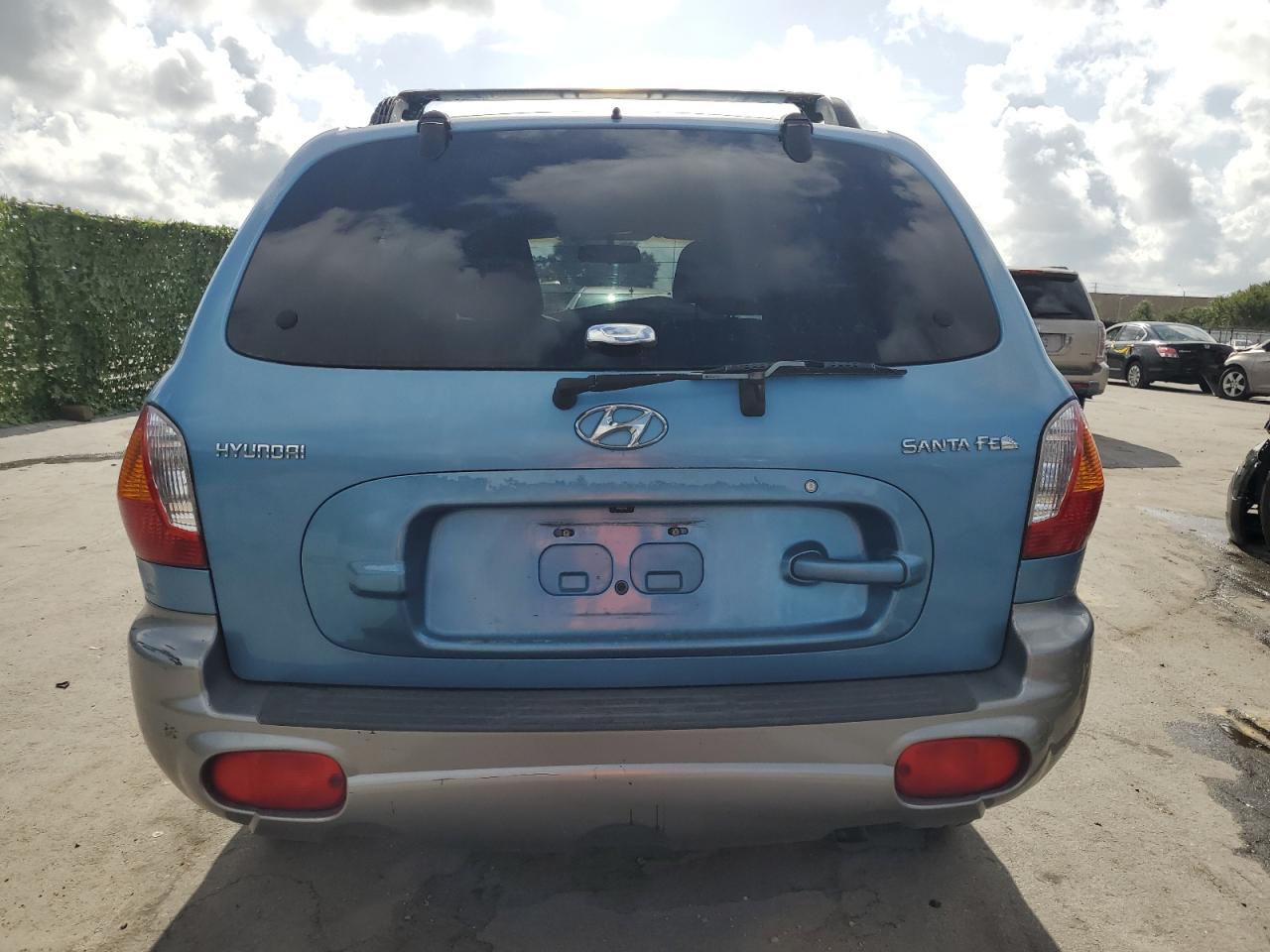 2004 Hyundai Santa Fe Gl VIN: KM8SB12B44U717891 Lot: 64640474