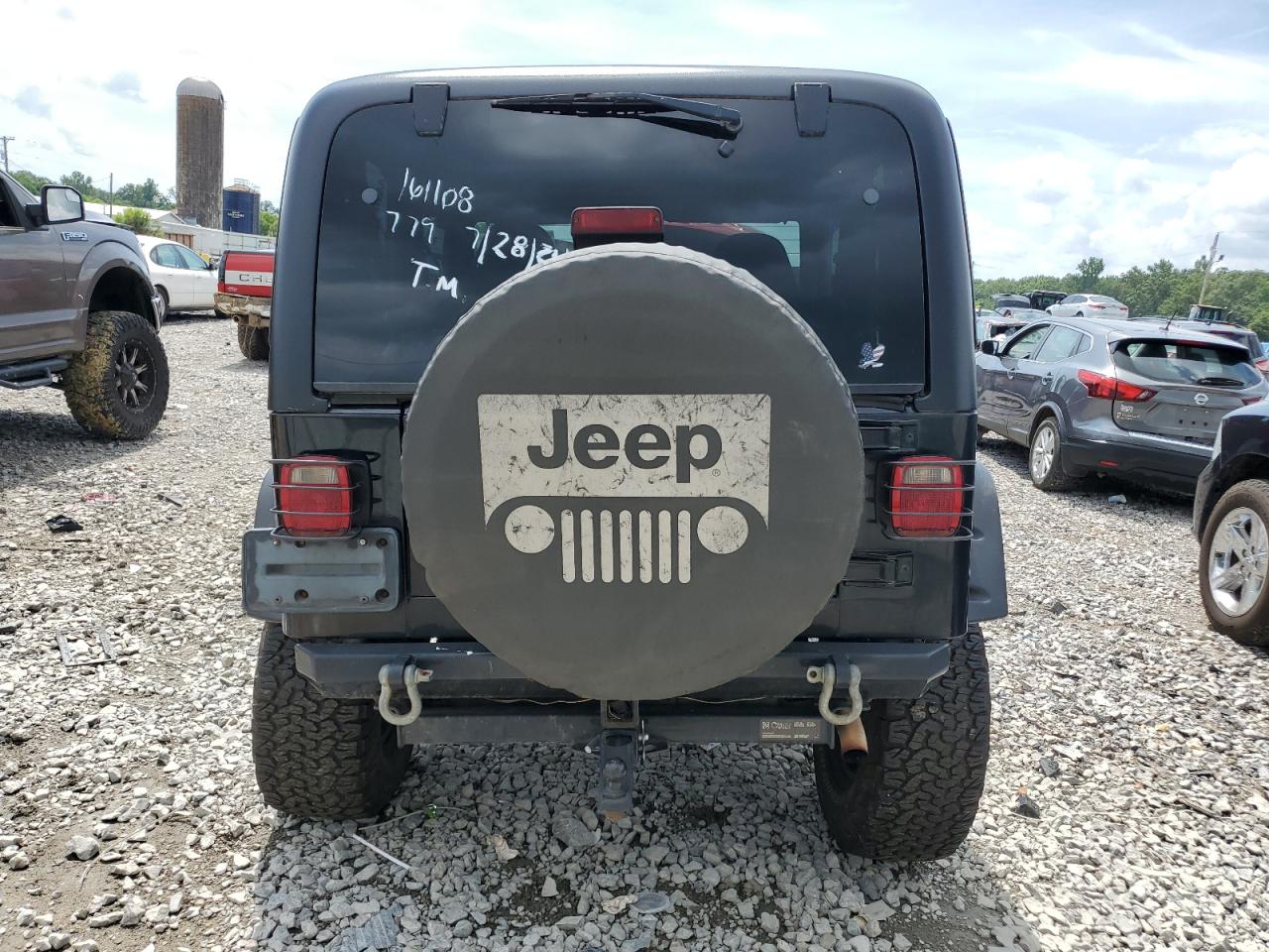 2002 Jeep Wrangler / Tj Sport VIN: 1J4FA49S82P758191 Lot: 65439624