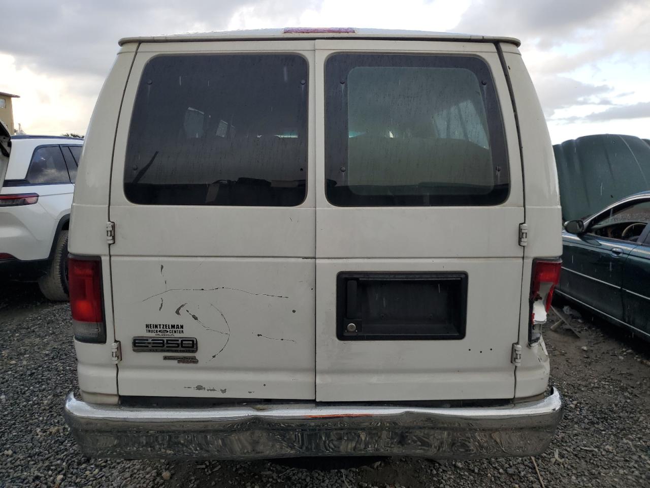 2010 Ford Econoline E350 Super Duty Wagon VIN: 1FBSS3BL4ADA03011 Lot: 63199414