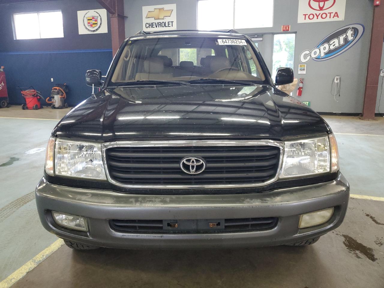 1999 Toyota Land Cruiser VIN: JT3HT05J2X0069086 Lot: 64736254