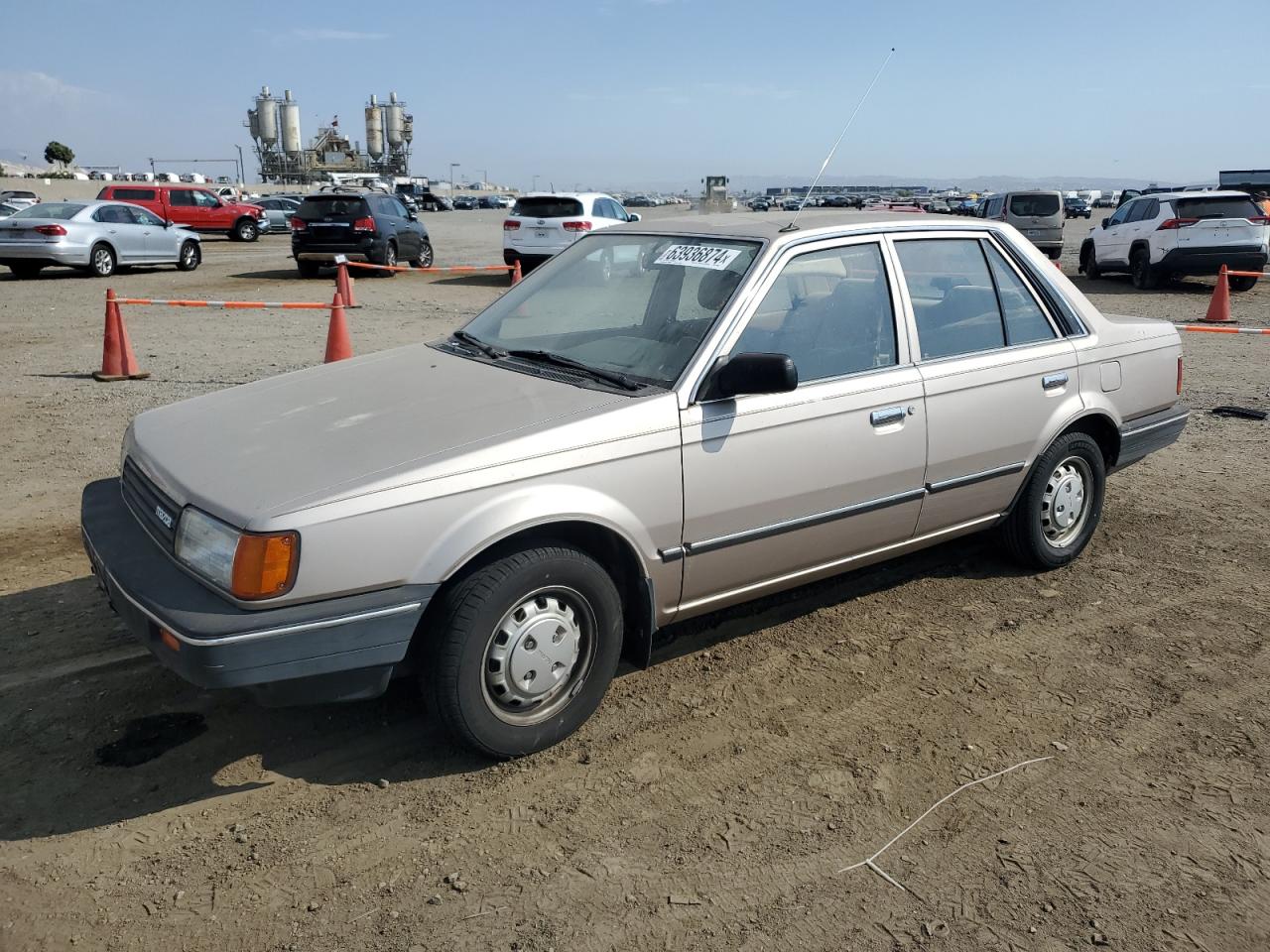 1987 Mazda 323 VIN: JM1BF2224H0557992 Lot: 63936874