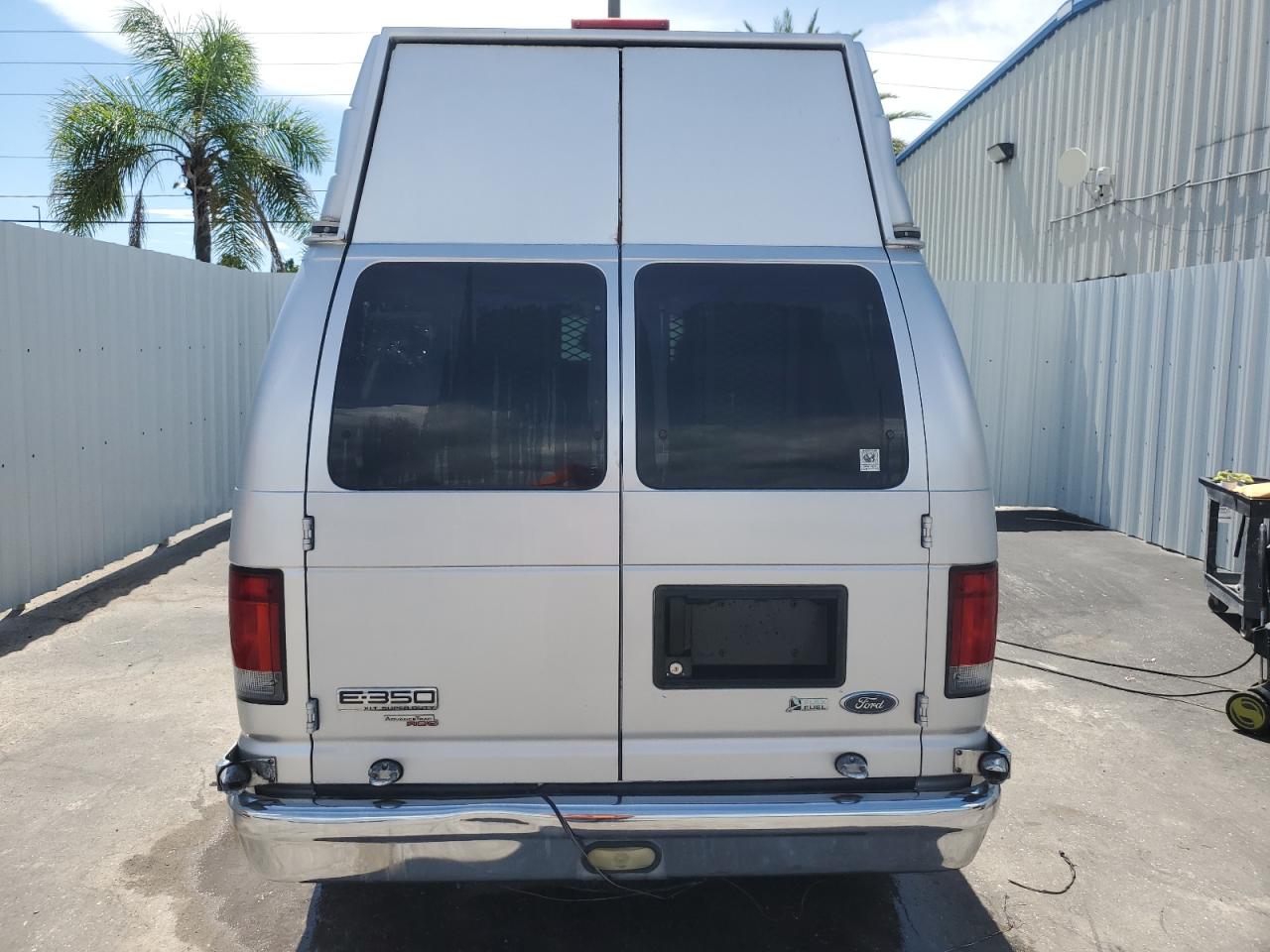 2011 Ford Econoline E350 Super Duty Wagon VIN: 1FBNE3BL9BDA96808 Lot: 63808014