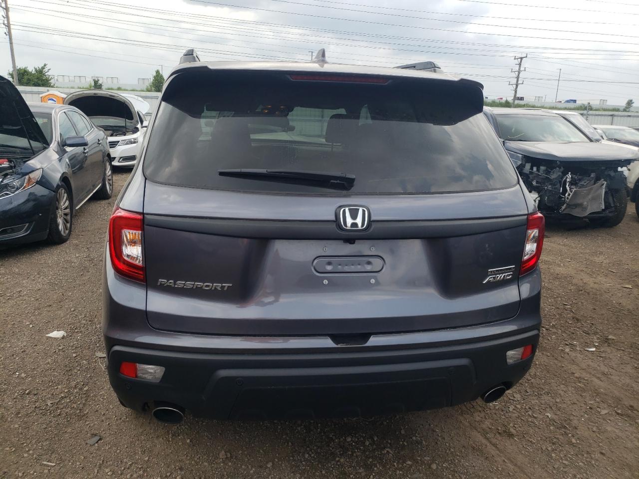 2020 Honda Passport Touring VIN: 5FNYF8H96LB009763 Lot: 64172464