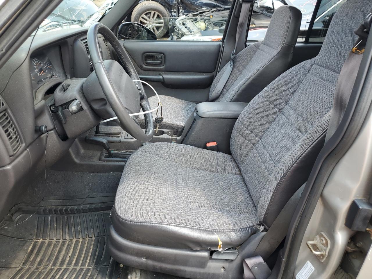 2001 Jeep Cherokee Sport VIN: 1J4FF48S31L573054 Lot: 62345104