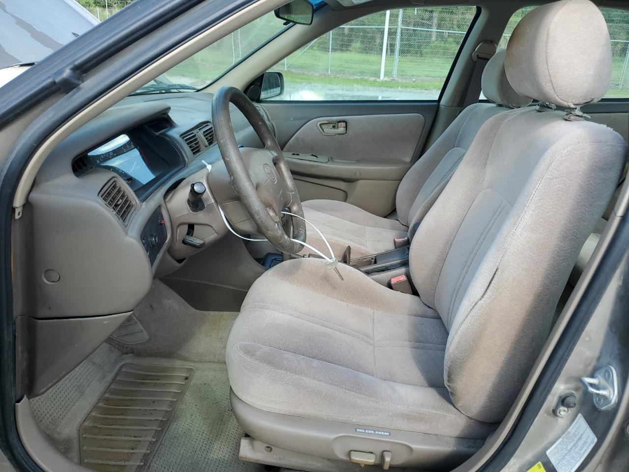 1999 Toyota Camry Ce VIN: 4T1BG28K0XU574943 Lot: 64260654