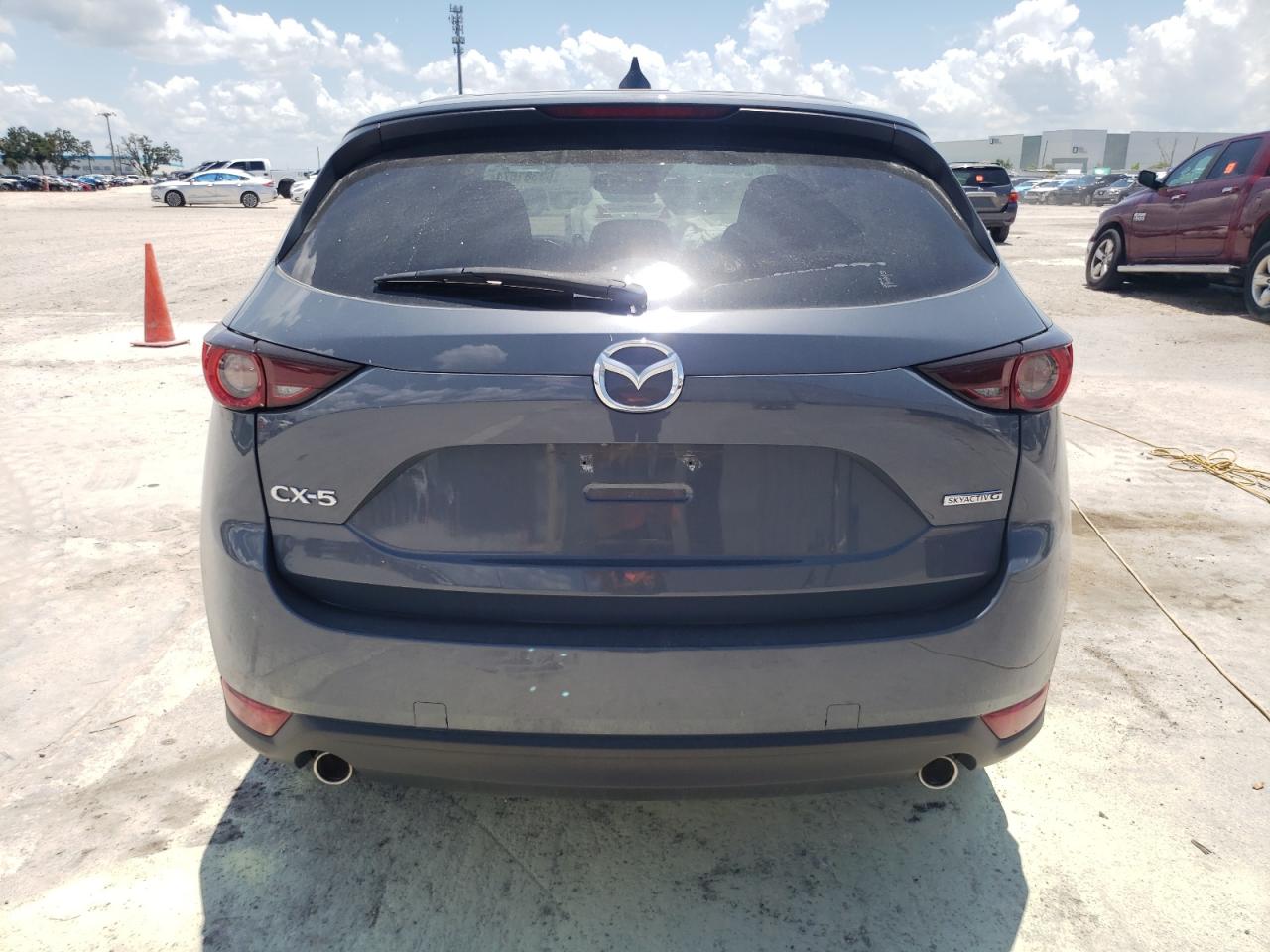 2021 Mazda Cx-5 Touring VIN: JM3KFACMXM0394650 Lot: 63381874