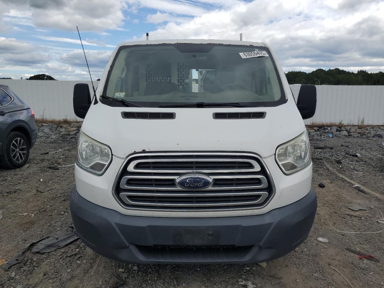 2015 Ford Transit T-250 VIN: 1FTNR1ZM2FKB20094 Lot: 63055495