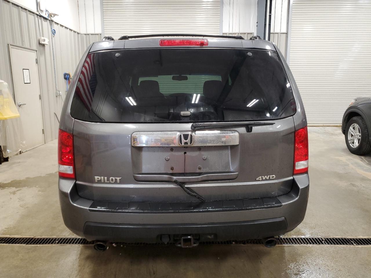 2011 Honda Pilot Exl VIN: 5FNYF4H5XBB073390 Lot: 64736215