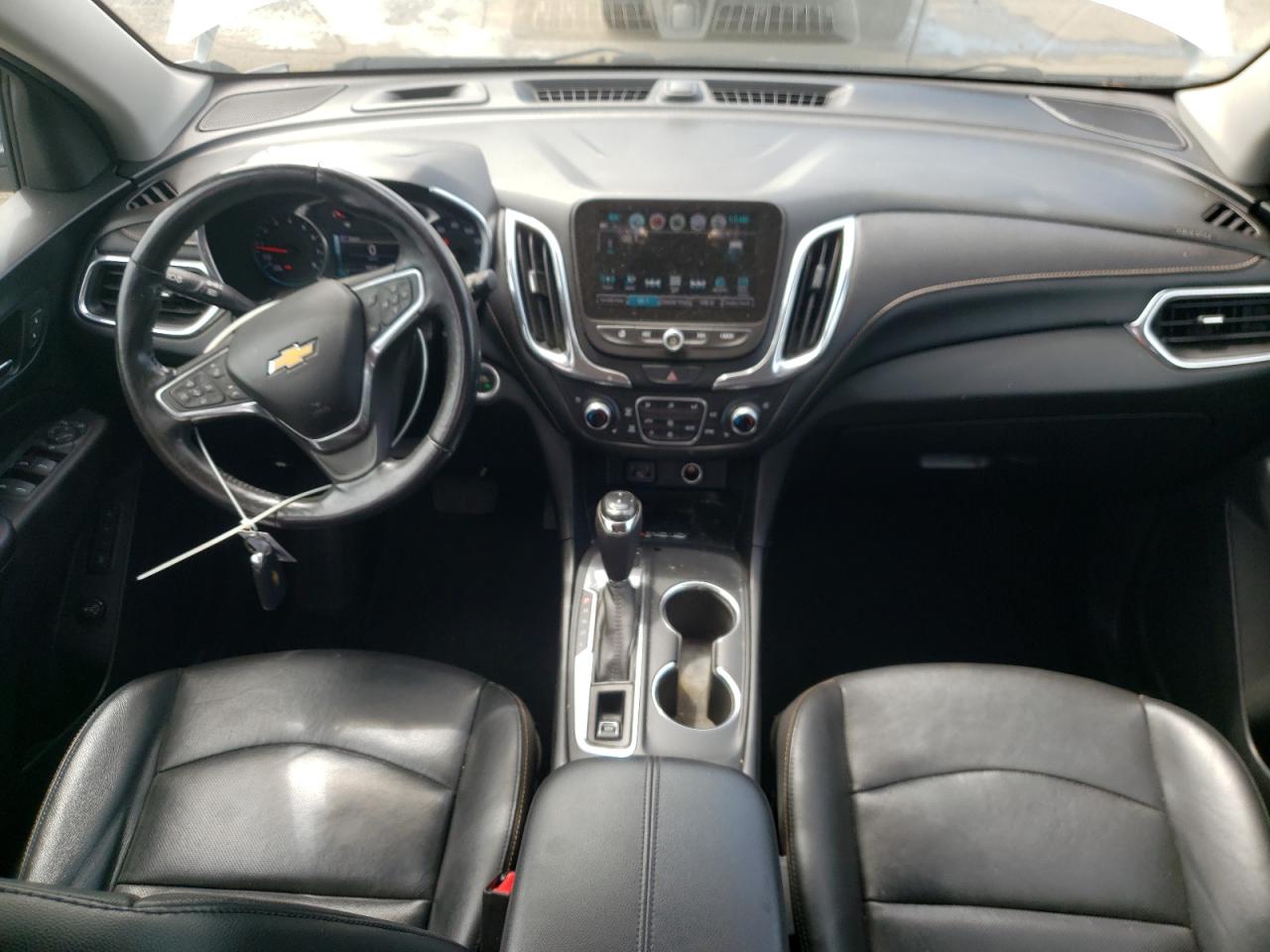 2018 Chevrolet Equinox Premier VIN: 2GNAXVEV6J6306010 Lot: 64092035