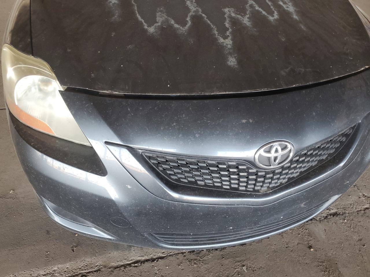 2010 Toyota Yaris VIN: JTDBT4K32A4077106 Lot: 64037575
