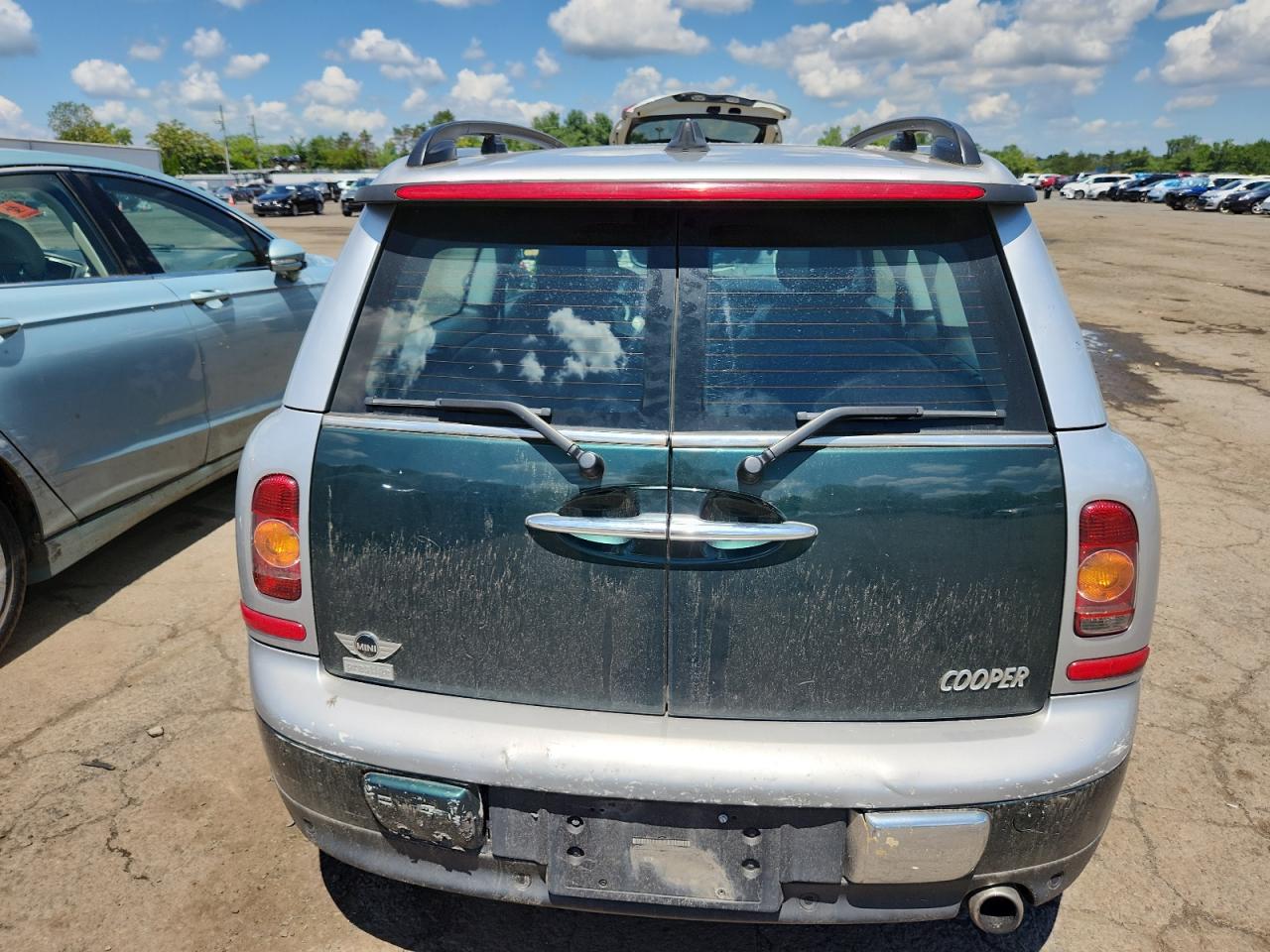 2010 Mini Cooper Clubman VIN: WMWML3C57ATX51594 Lot: 65019725