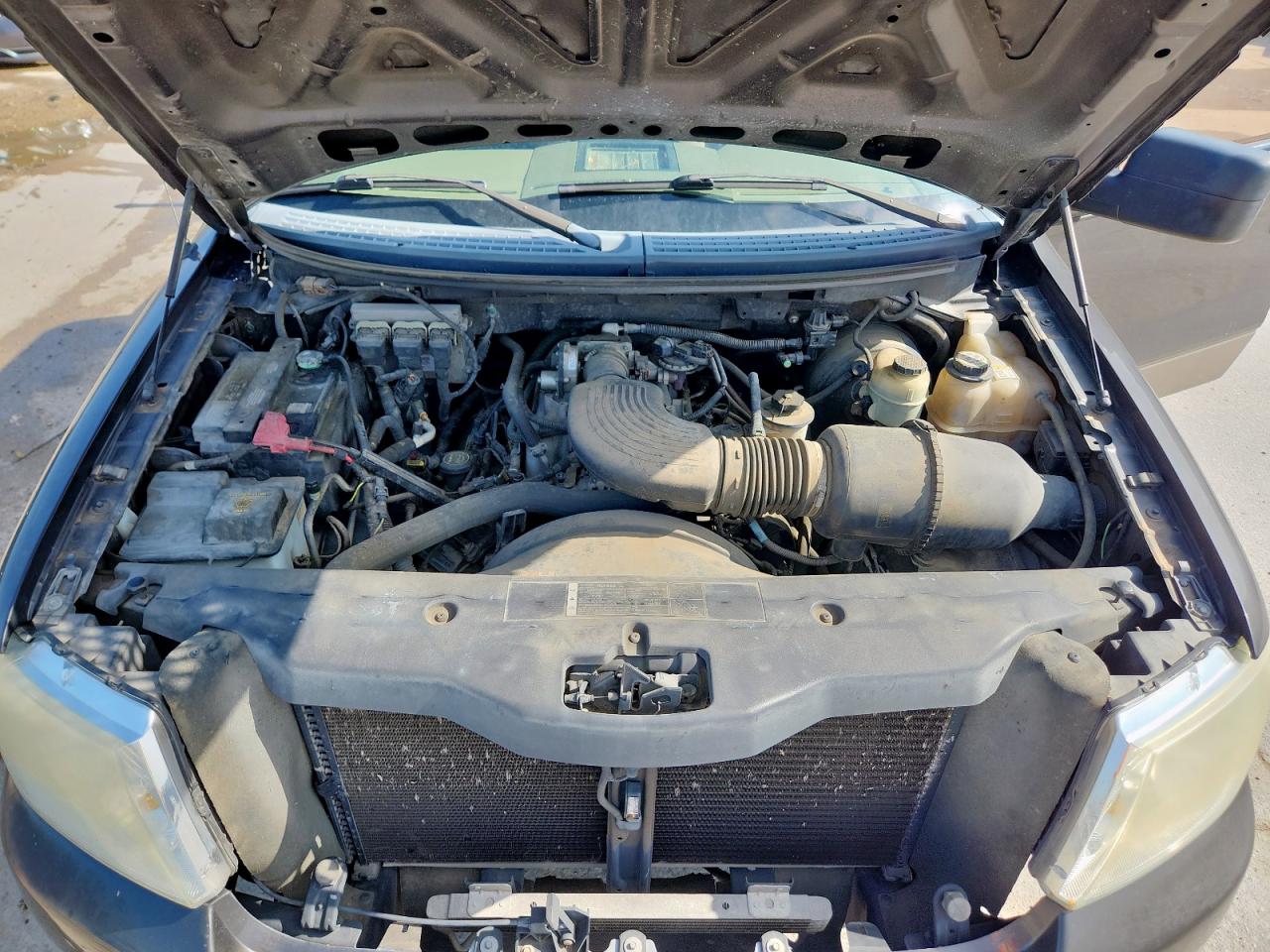 2005 Ford F150 VIN: 1FTRX12W15NB21432 Lot: 63499995
