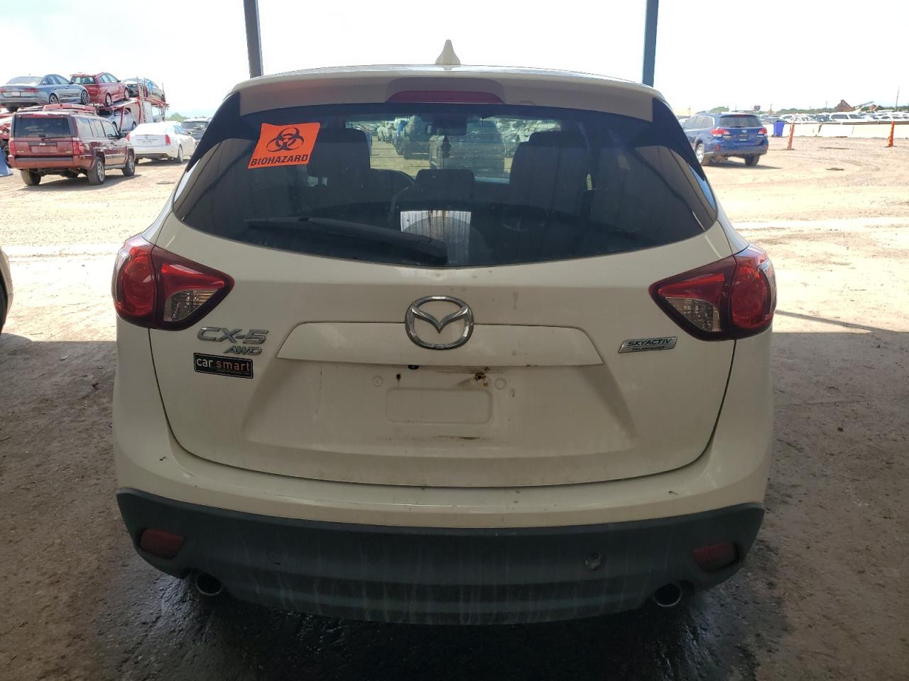 2014 Mazda Cx-5 Touring VIN: JM3KE4CY7E0403734 Lot: 63789005