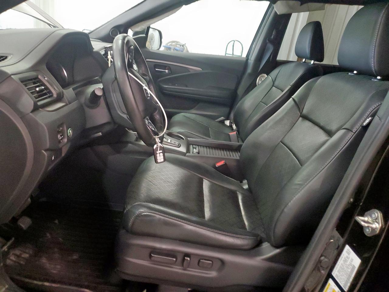 2021 Honda Passport Exl VIN: 5FNYF7H52MB000129 Lot: 63862435