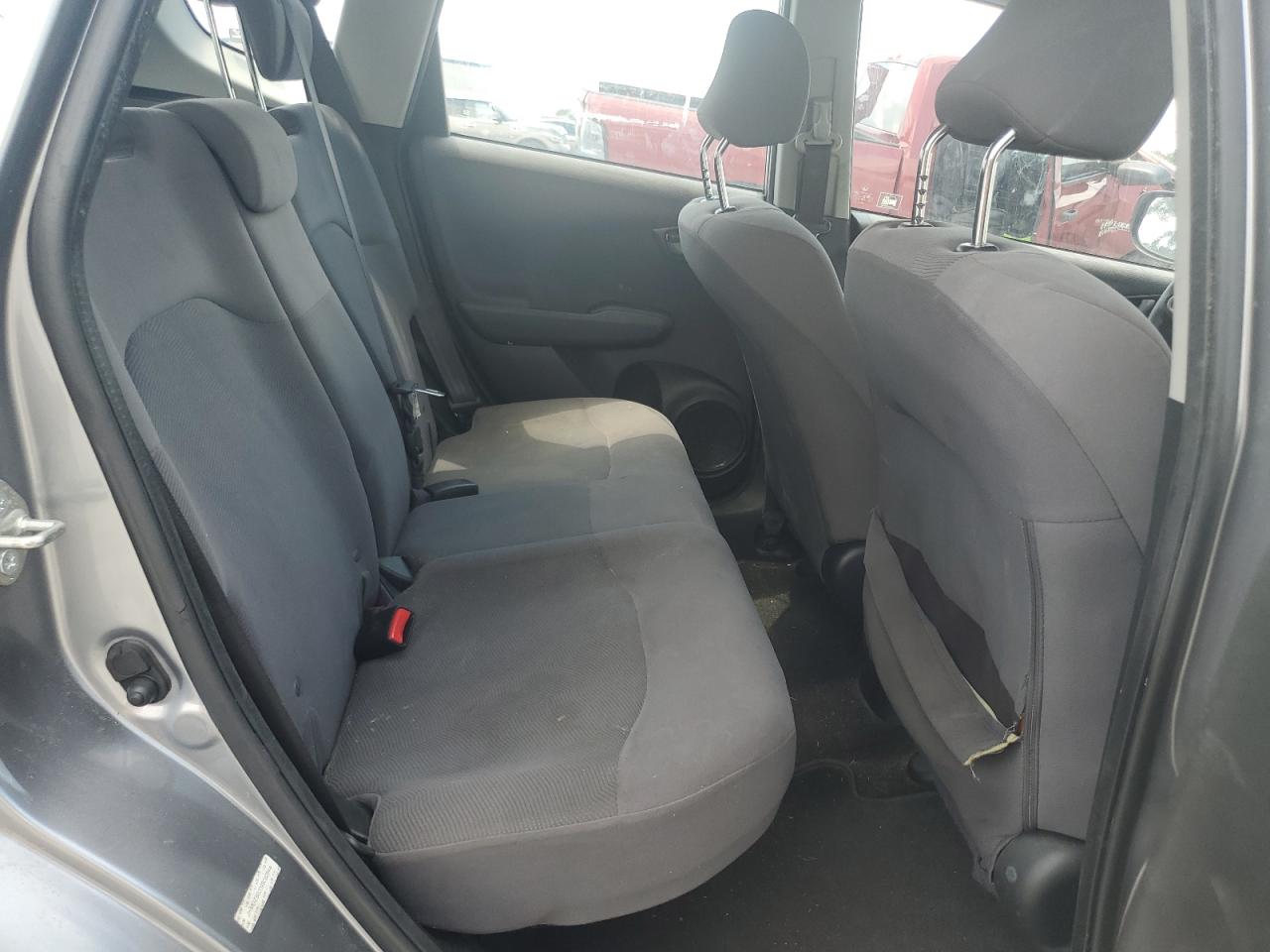 2009 Honda Fit VIN: JHMGE88209S052944 Lot: 65504835