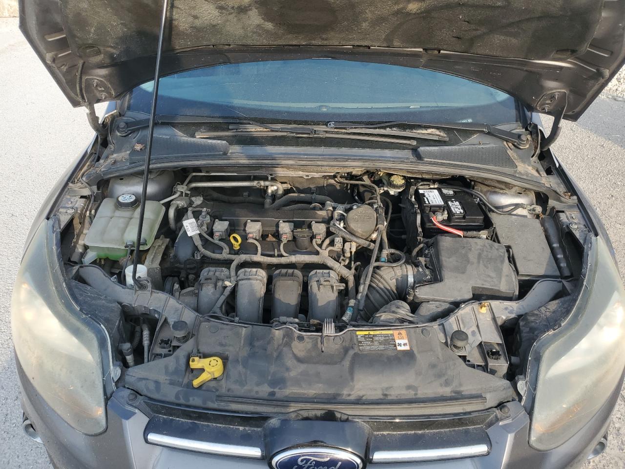 2014 Ford Focus Titanium VIN: 1FADP3N2XEL107612 Lot: 65070935