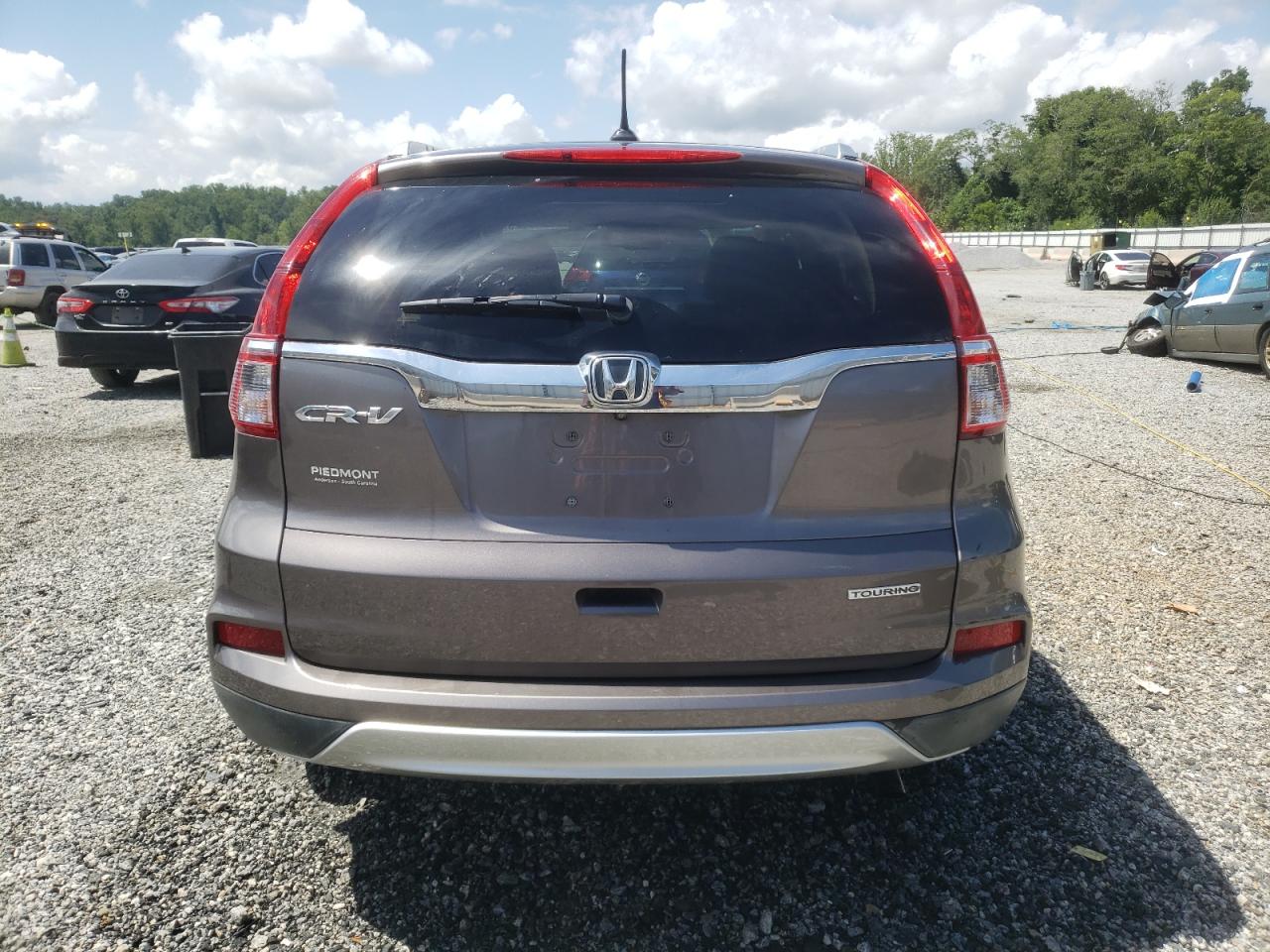2015 Honda Cr-V Touring VIN: 5J6RM3H97FL019257 Lot: 64743025