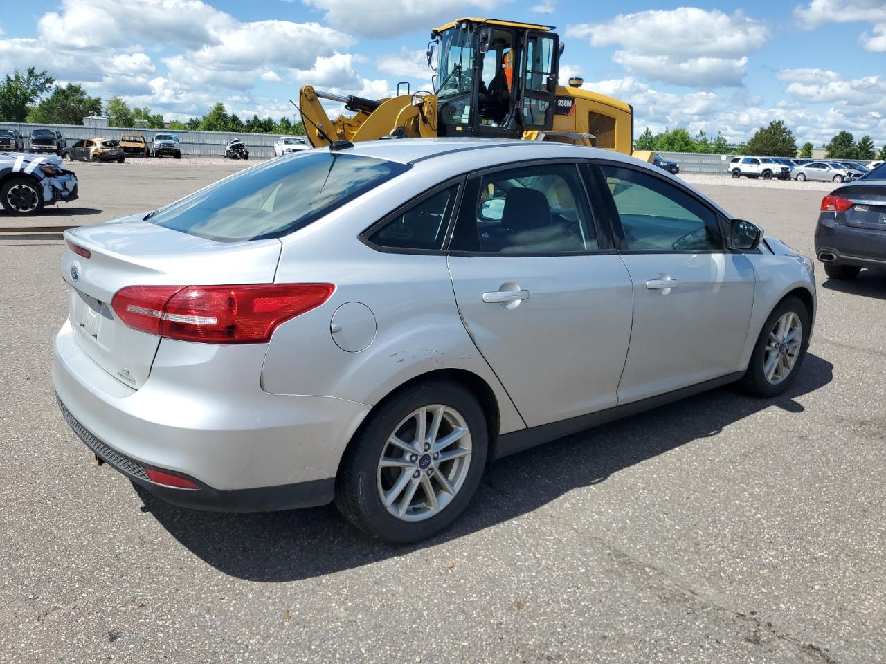 2015 Ford Focus Se VIN: 1FADP3F27FL329685 Lot: 64780805