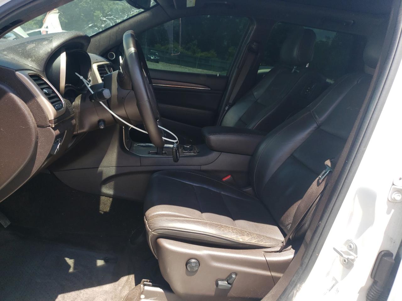 2015 Jeep Grand Cherokee Summit VIN: 1C4RJFJM0FC128965 Lot: 63041525