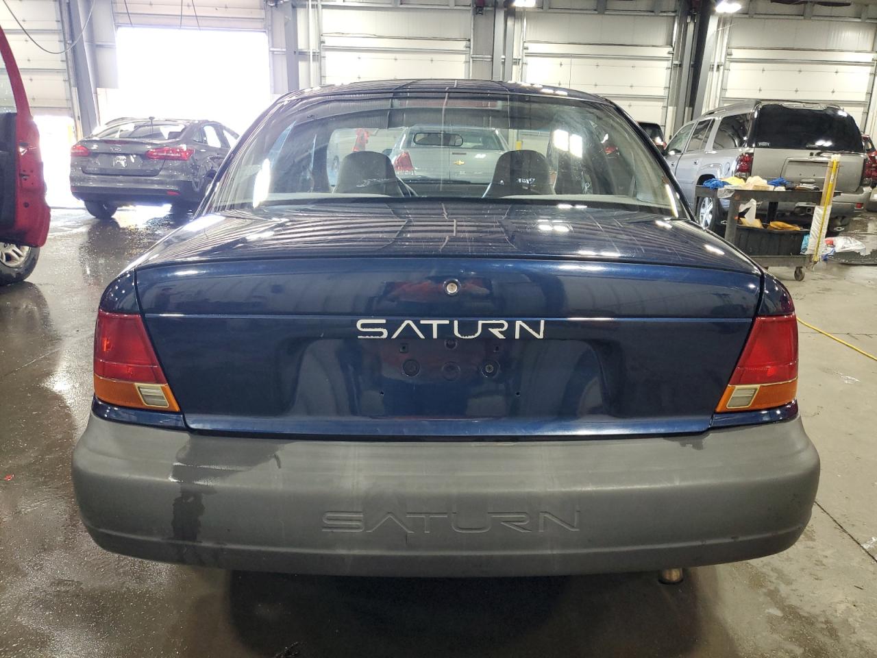 1999 Saturn Sl1 VIN: 1G8ZG5281XZ329776 Lot: 63295095