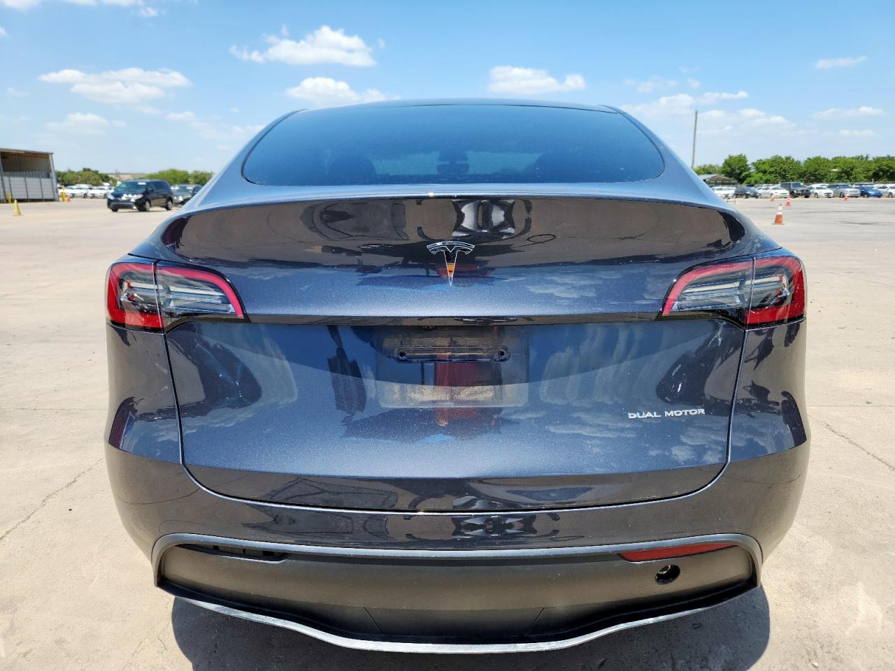 2023 Tesla Model Y VIN: 7SAYGDEE2PA087874 Lot: 66696225