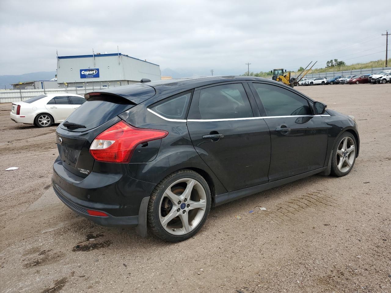 2014 Ford Focus Titanium VIN: 1FADP3N29EL396398 Lot: 65085785