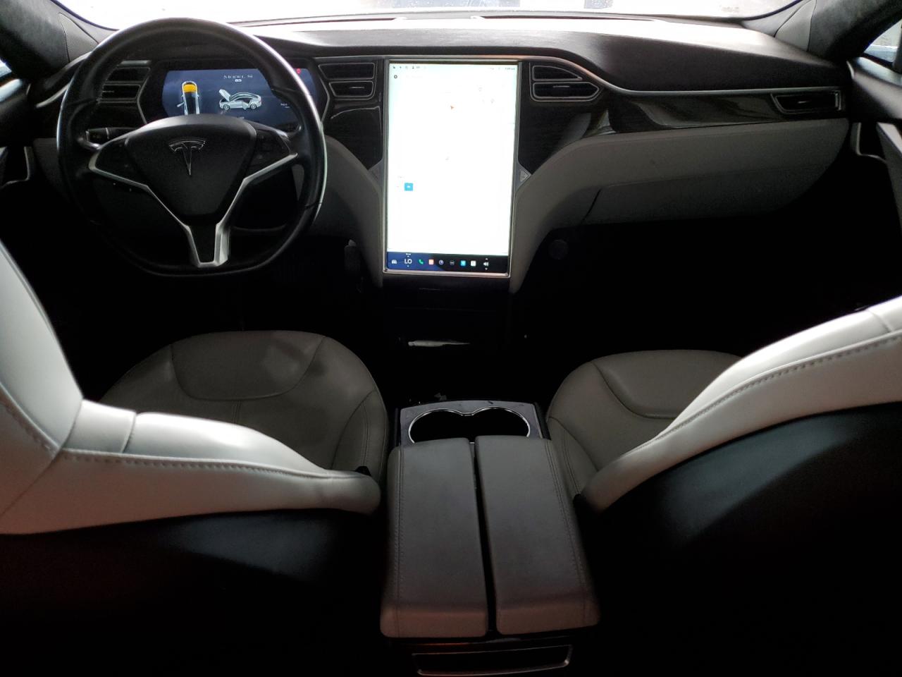 2014 Tesla Model S VIN: 5YJSA1H19EFP61319 Lot: 64798375