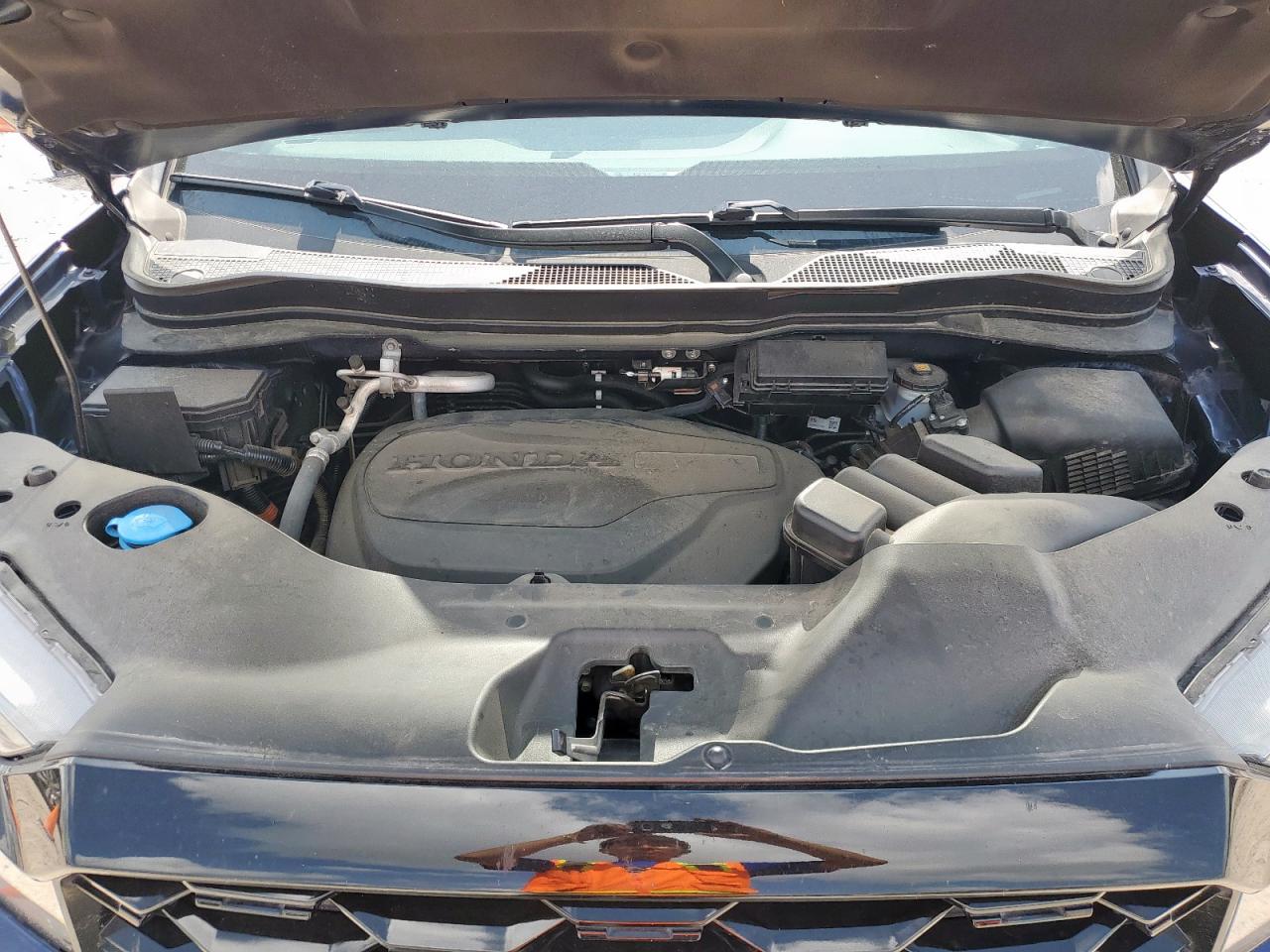 2023 Honda Passport Elite VIN: 5FNYF8H04PB026424 Lot: 65095545
