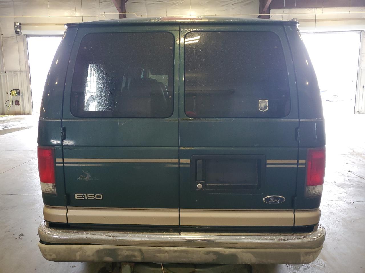 2001 Ford Econoline E150 Van VIN: 1FDRE14L71HA69804 Lot: 64798505
