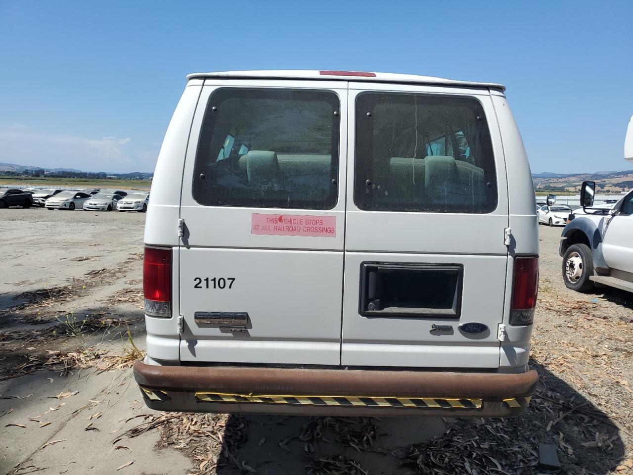 2009 Ford Econoline E350 Super Duty Wagon VIN: 1FBSS31LX9DA15435 Lot: 59525475