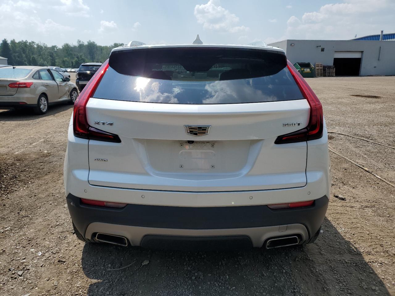 2021 Cadillac Xt4 Premium Luxury VIN: 1GYFZDR43MF079058 Lot: 63764165