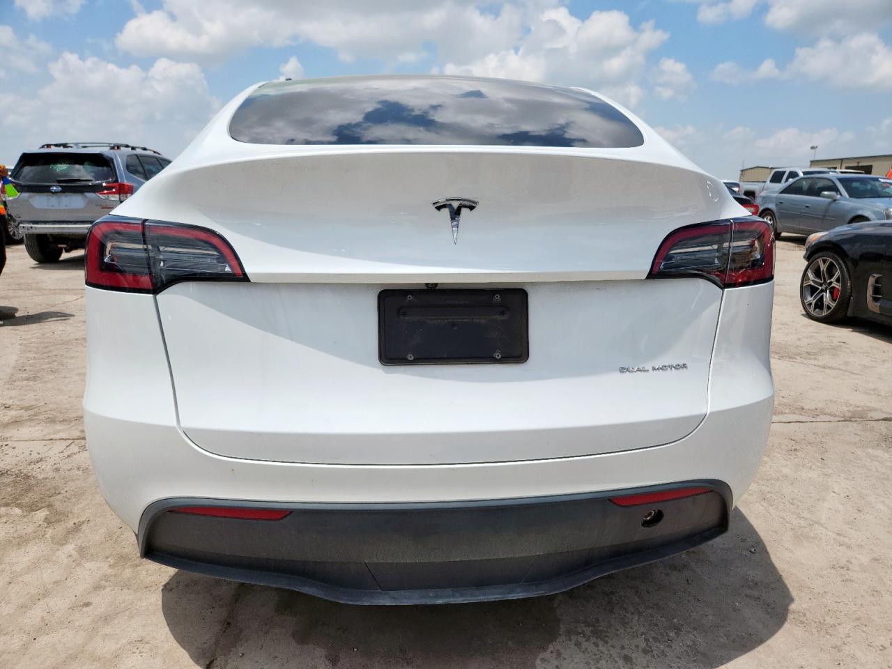 2023 Tesla Model Y VIN: 7SAYGDEE0PA077229 Lot: 64831285