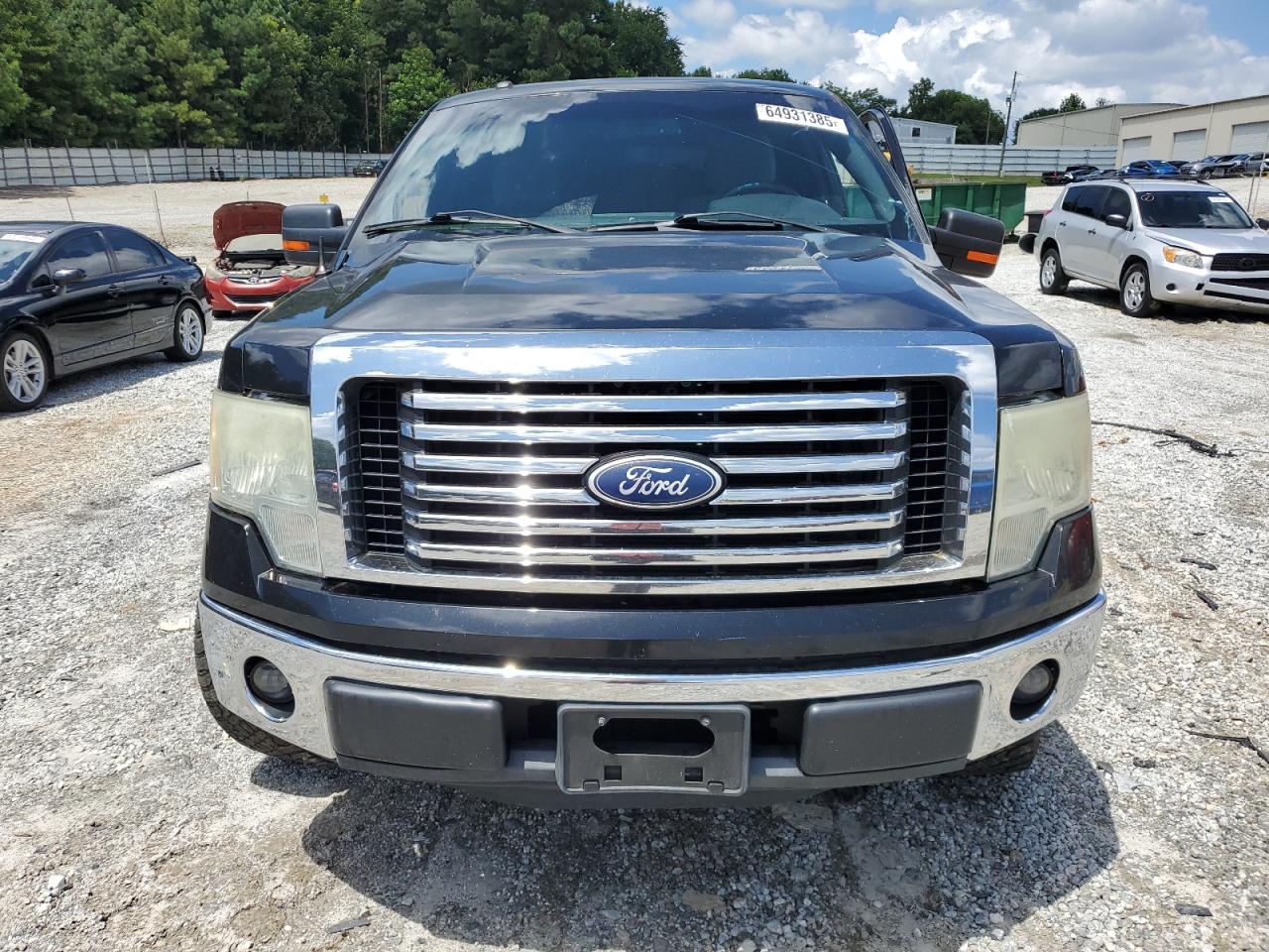 2011 Ford F150 Supercrew VIN: 1FTFW1CF0BFA59399 Lot: 64931385