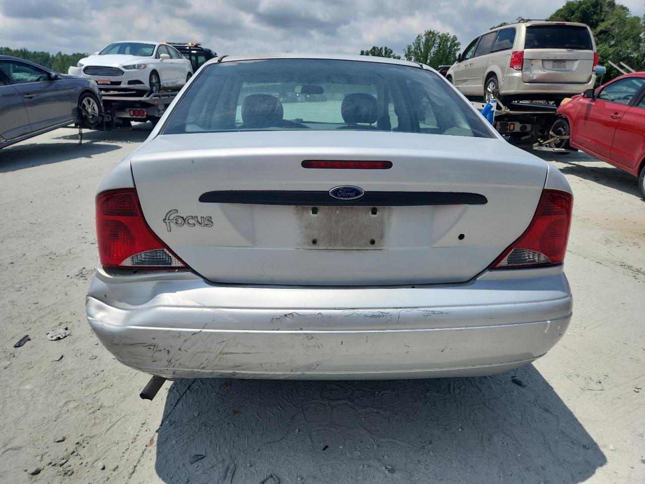 2004 Ford Focus Lx VIN: 1FAFP33P44W149486 Lot: 64574755