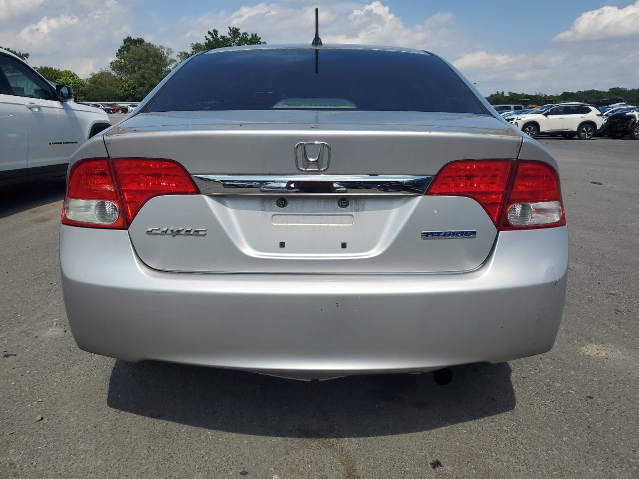2010 Honda Civic Hybrid VIN: JHMFA3F22AS004637 Lot: 65221995