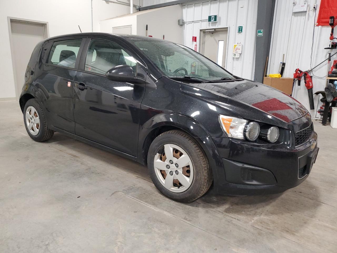 2015 Chevrolet Sonic Ls VIN: 1G1JA6SH0F4121144 Lot: 63904575