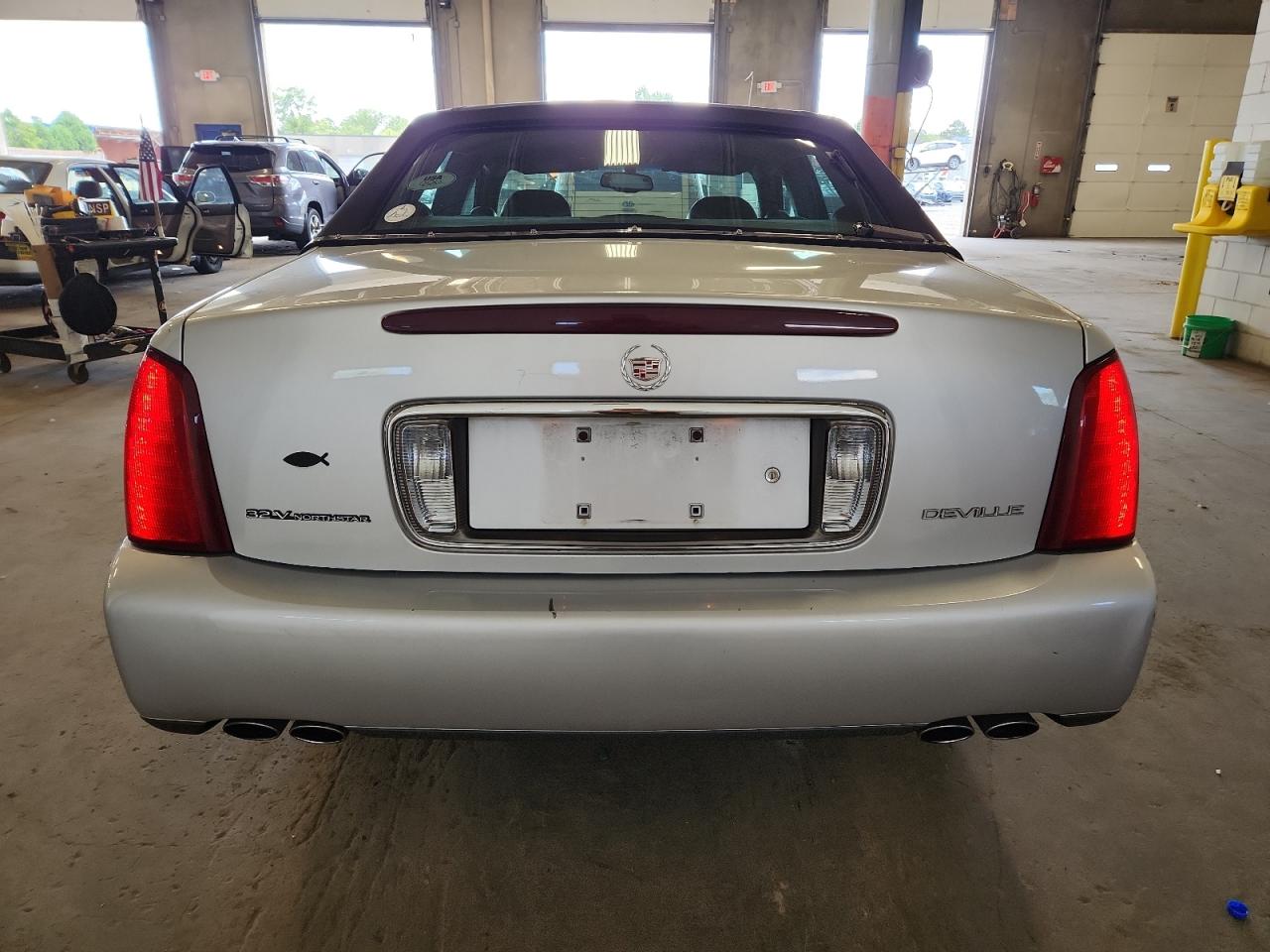 2003 Cadillac Deville VIN: 1G6KD54Y43U122323 Lot: 65383305