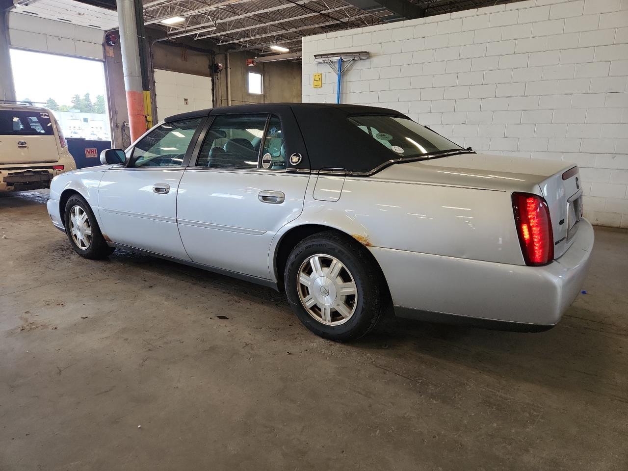 2003 Cadillac Deville VIN: 1G6KD54Y43U122323 Lot: 65383305