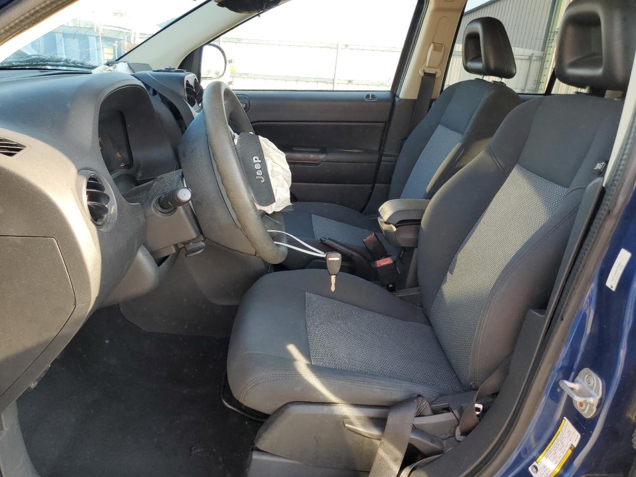 2009 Jeep Compass Sport VIN: 1J4FT47AX9D124493 Lot: 63558905