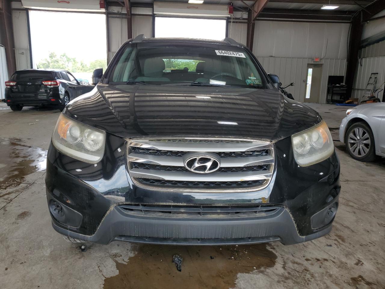 2012 Hyundai Santa Fe Gls VIN: 5XYZGDAB9CG102809 Lot: 66402475