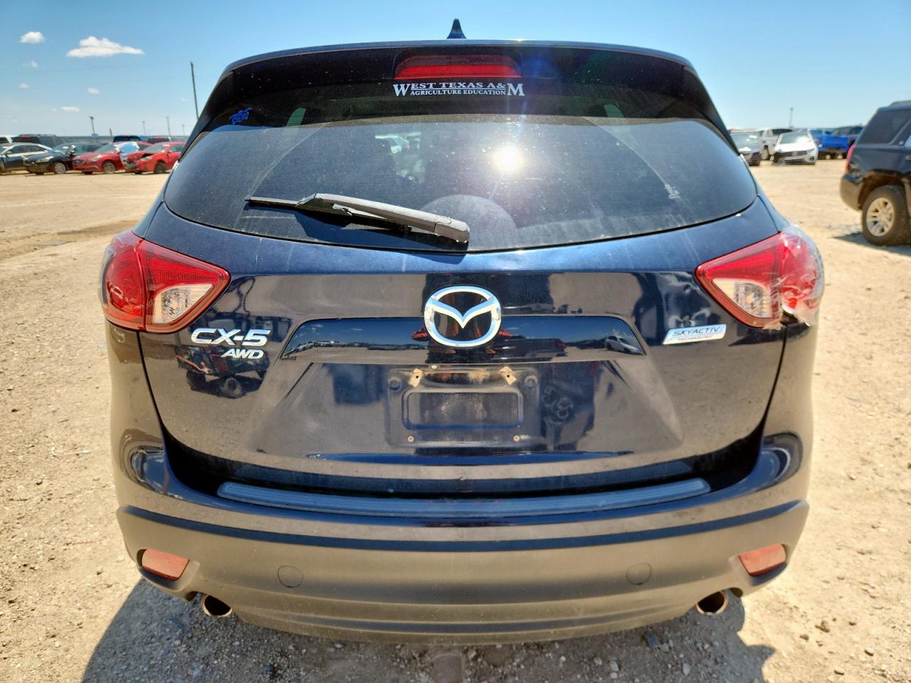 2014 Mazda Cx-5 Touring VIN: JM3KE4CYXE0411651 Lot: 63317095
