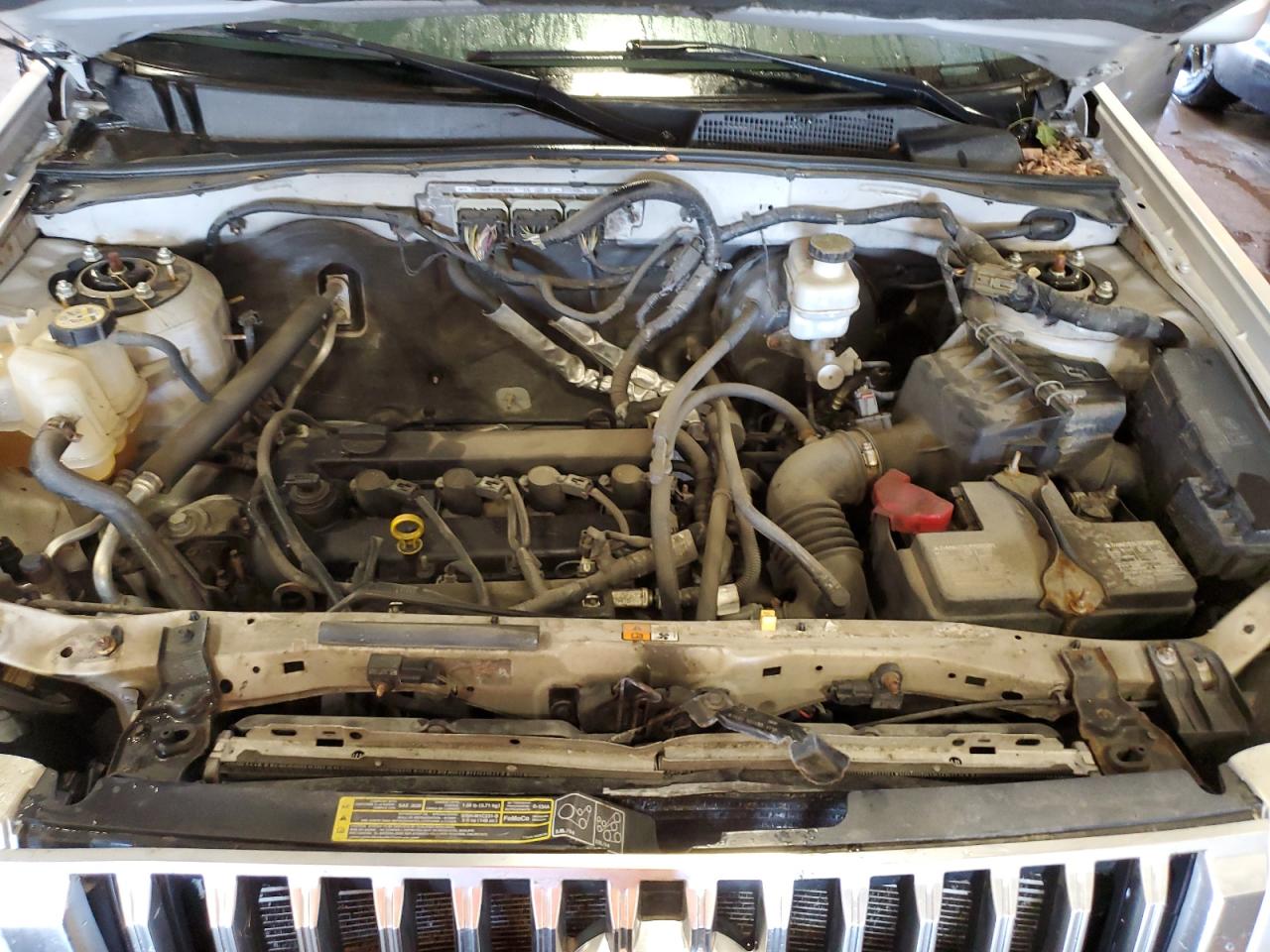 2009 Mercury Mariner Premier VIN: 4M2CU87759KJ18902 Lot: 80387945