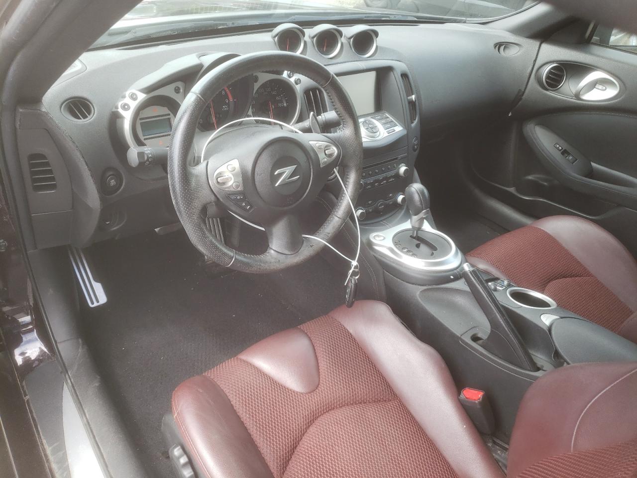 2010 Nissan 370Z VIN: JN1AZ4FH9AM301166 Lot: 63385445