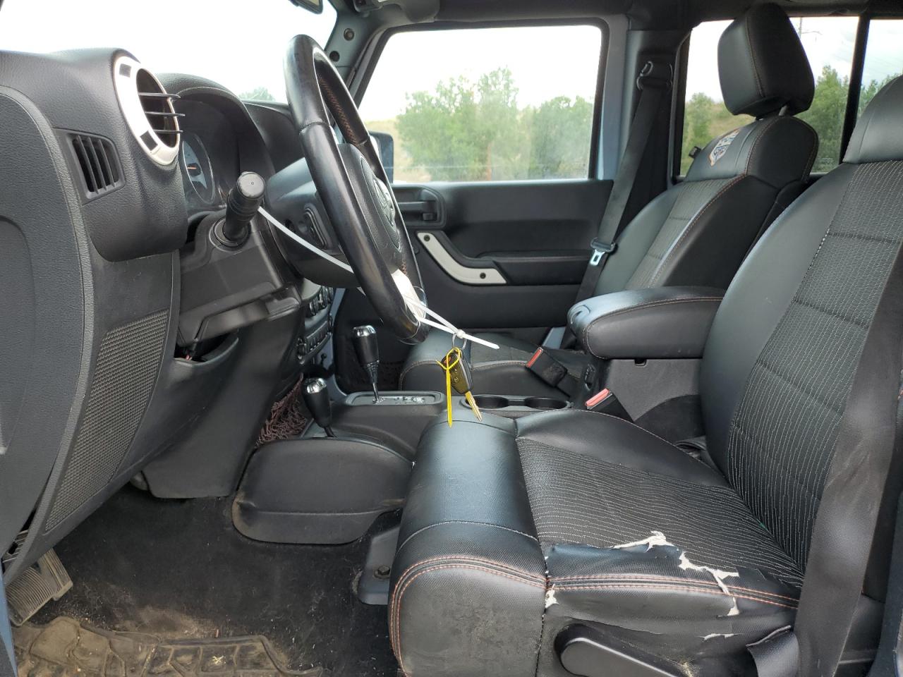 2012 Jeep Wrangler Unlimited Sahara VIN: 1C4HJWEG3CL150258 Lot: 63635155