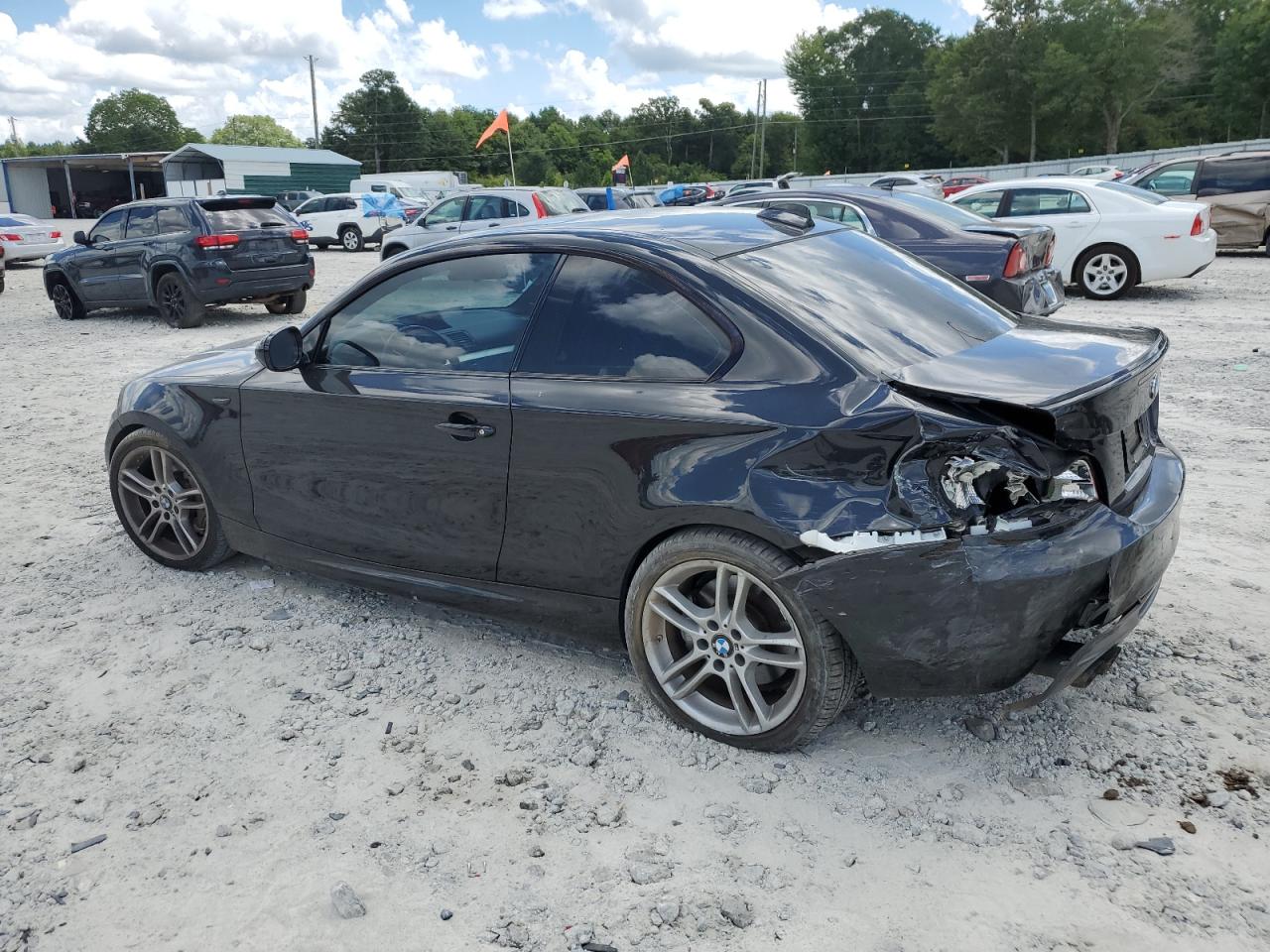 2011 BMW 135 I VIN: WBAUC9C54BVM09982 Lot: 65540125